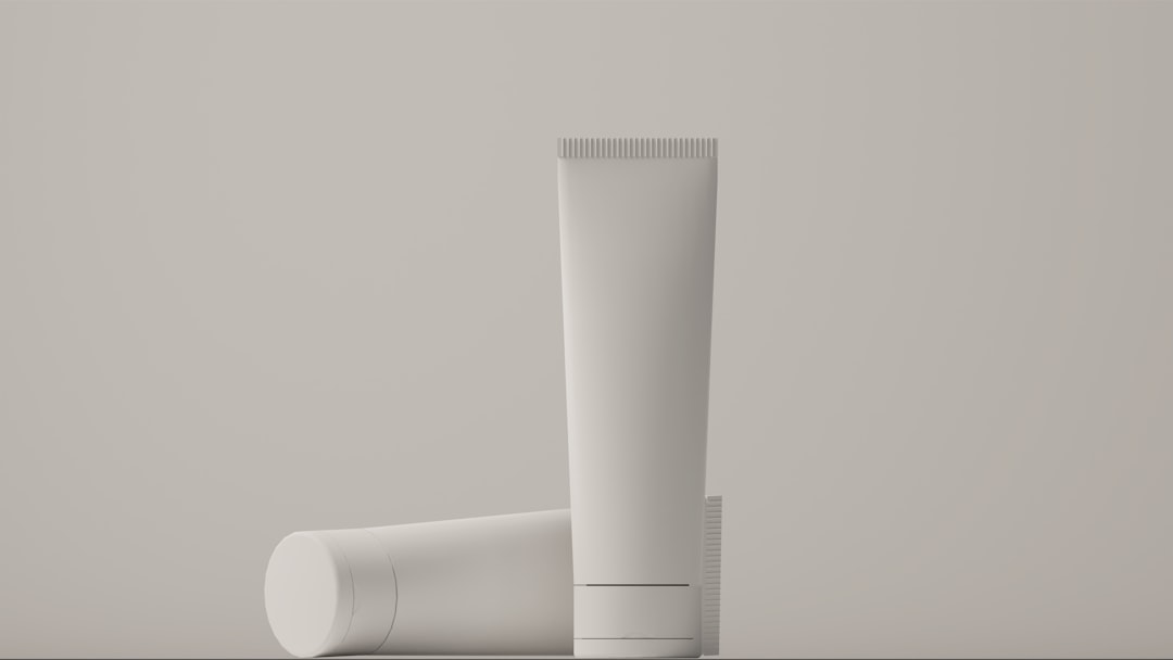 a tube of toothpaste next to a tube of toothpaste